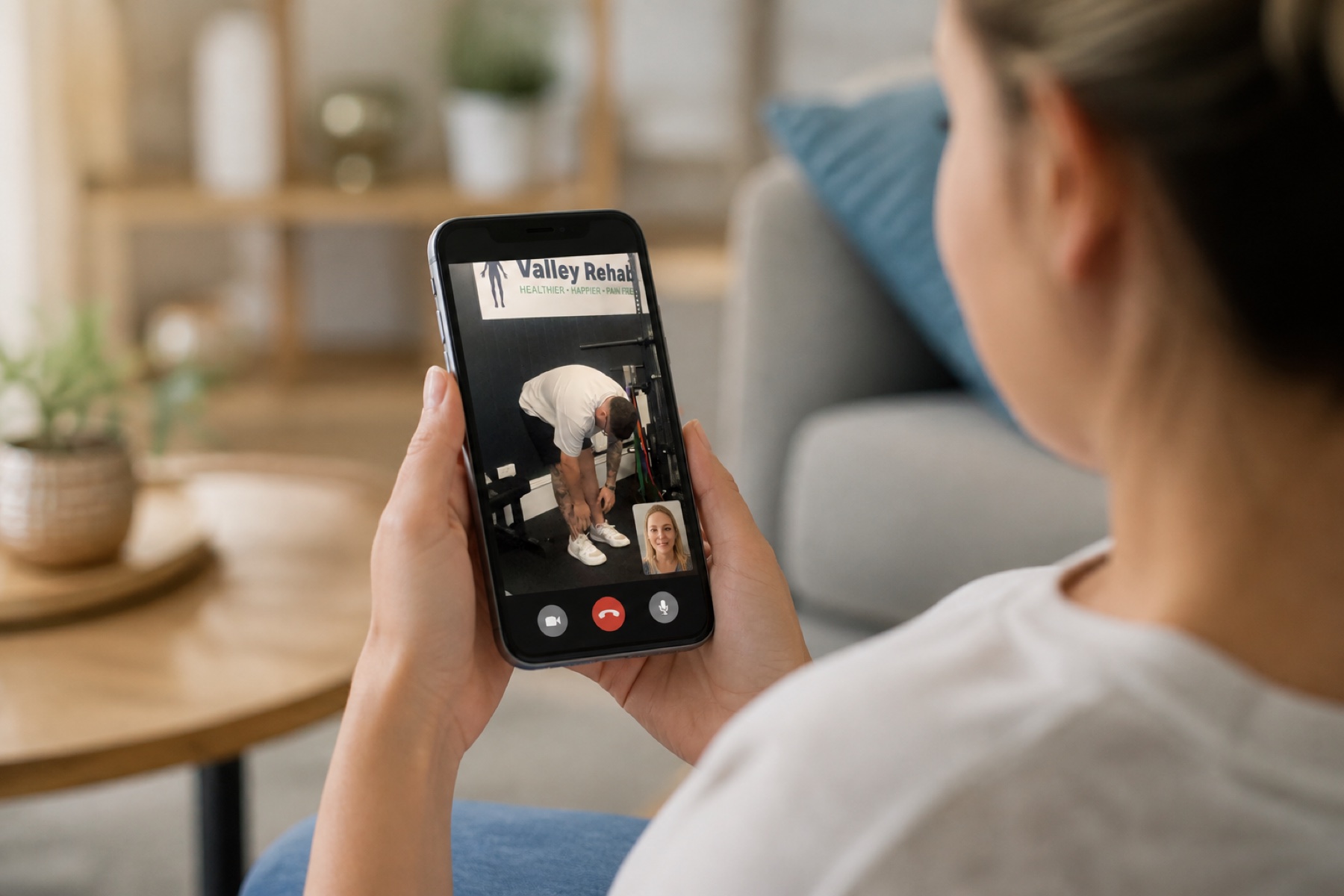 A person at home joining a Valley Rehab Google Meet assessment on their phone