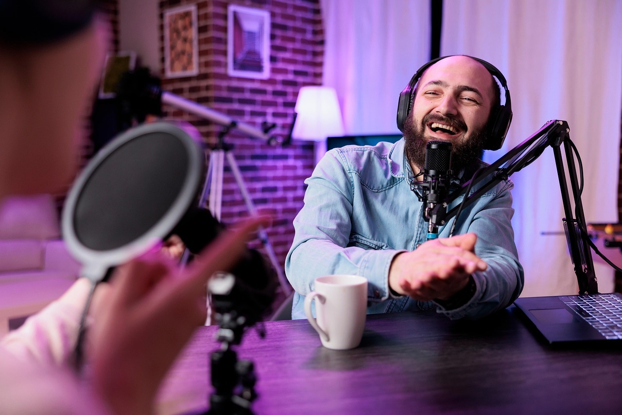 Host and guest recording a podcast livestream together