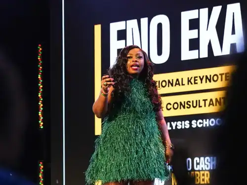 Eno Eka speaking on an international keynote stage
