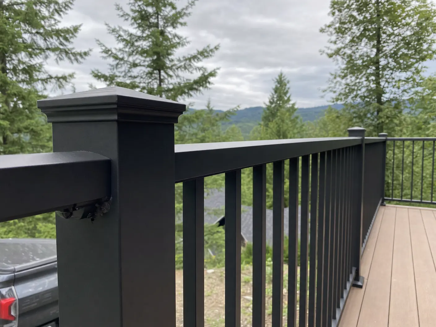 Deck railing installation Salem OR — black aluminum railing system Q&R Construction