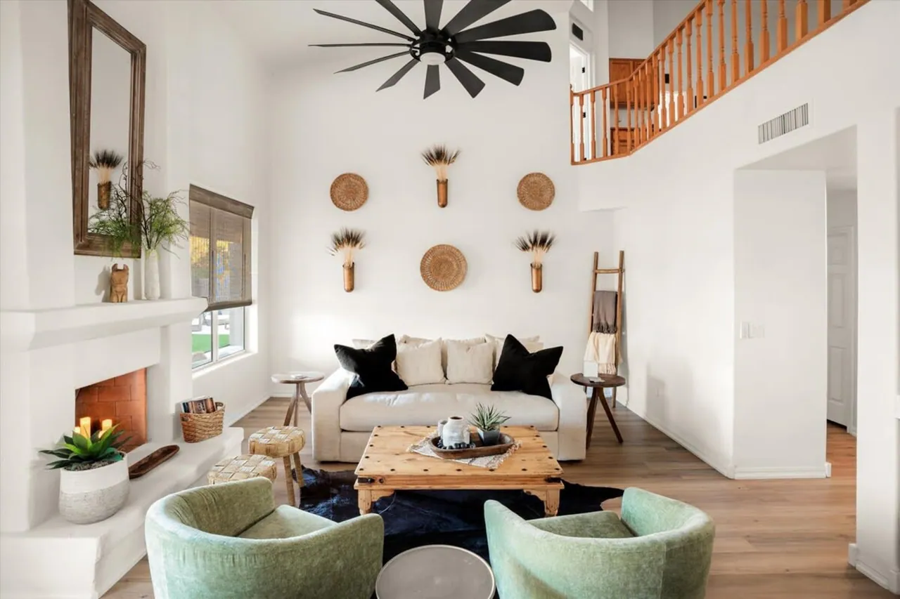 Interior renovation with a bright open living room by Logan Construction