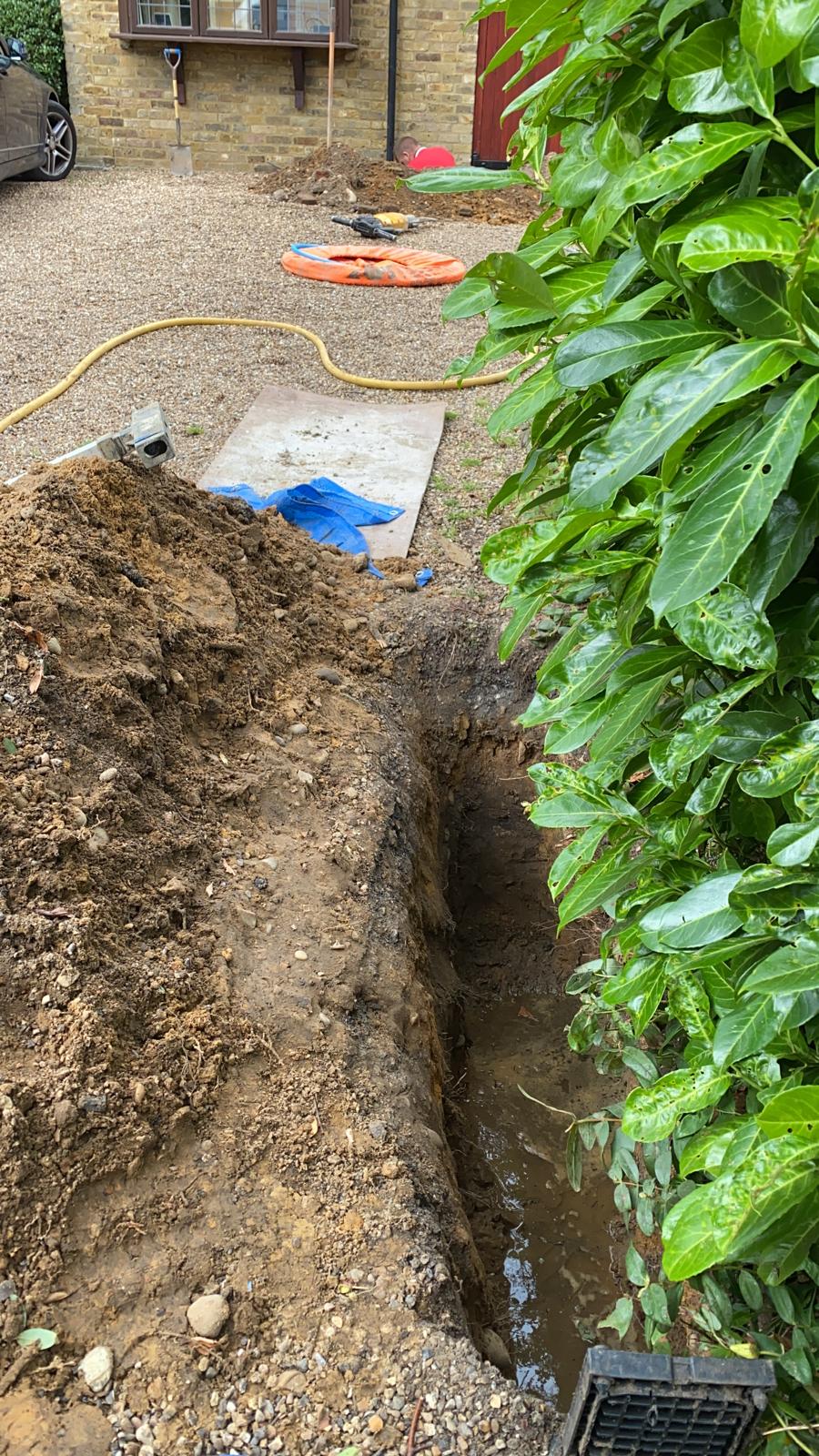 Moling pits for trenchless water main installation