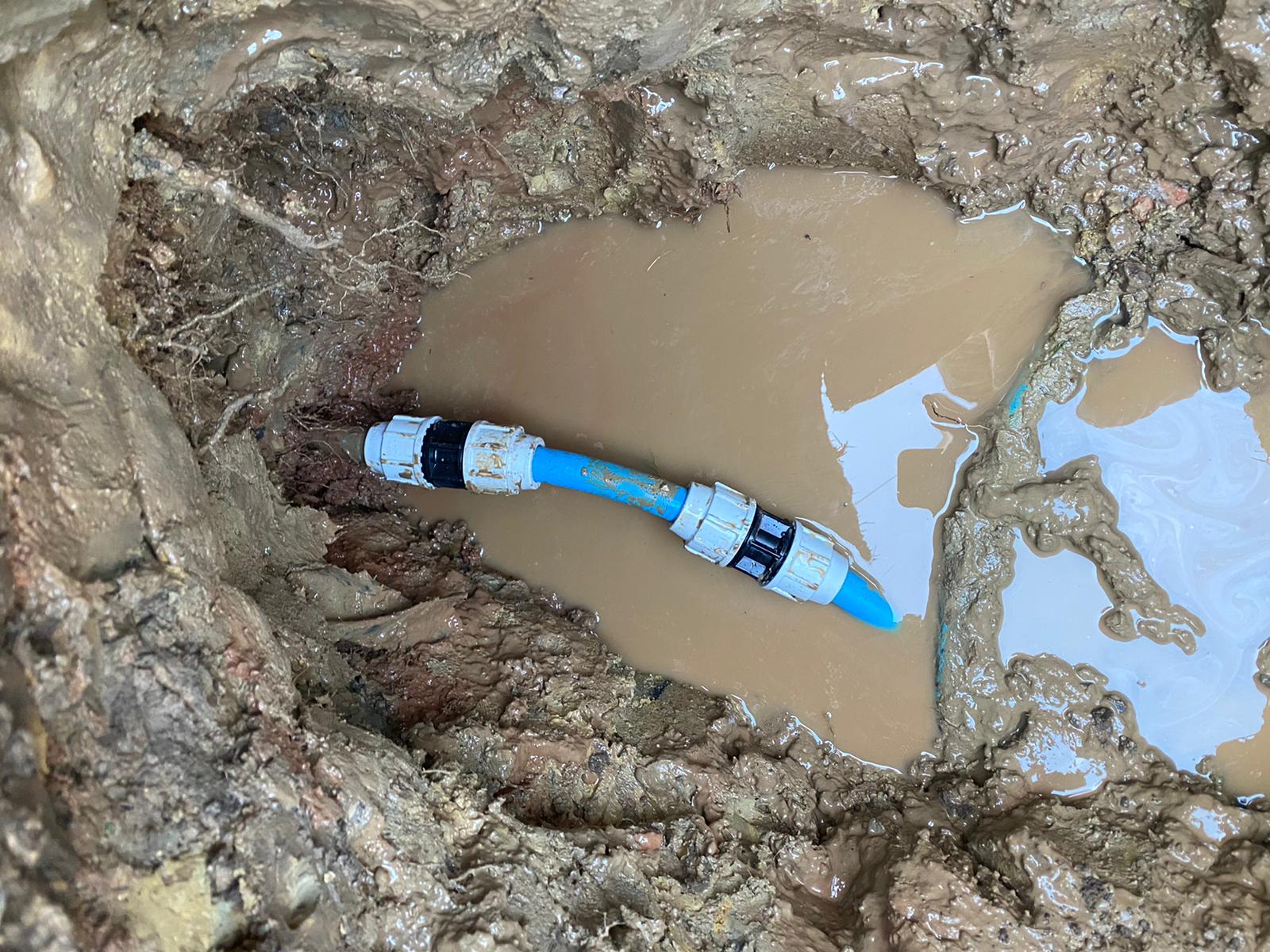 Underground water main repair completed by Kane and Sons