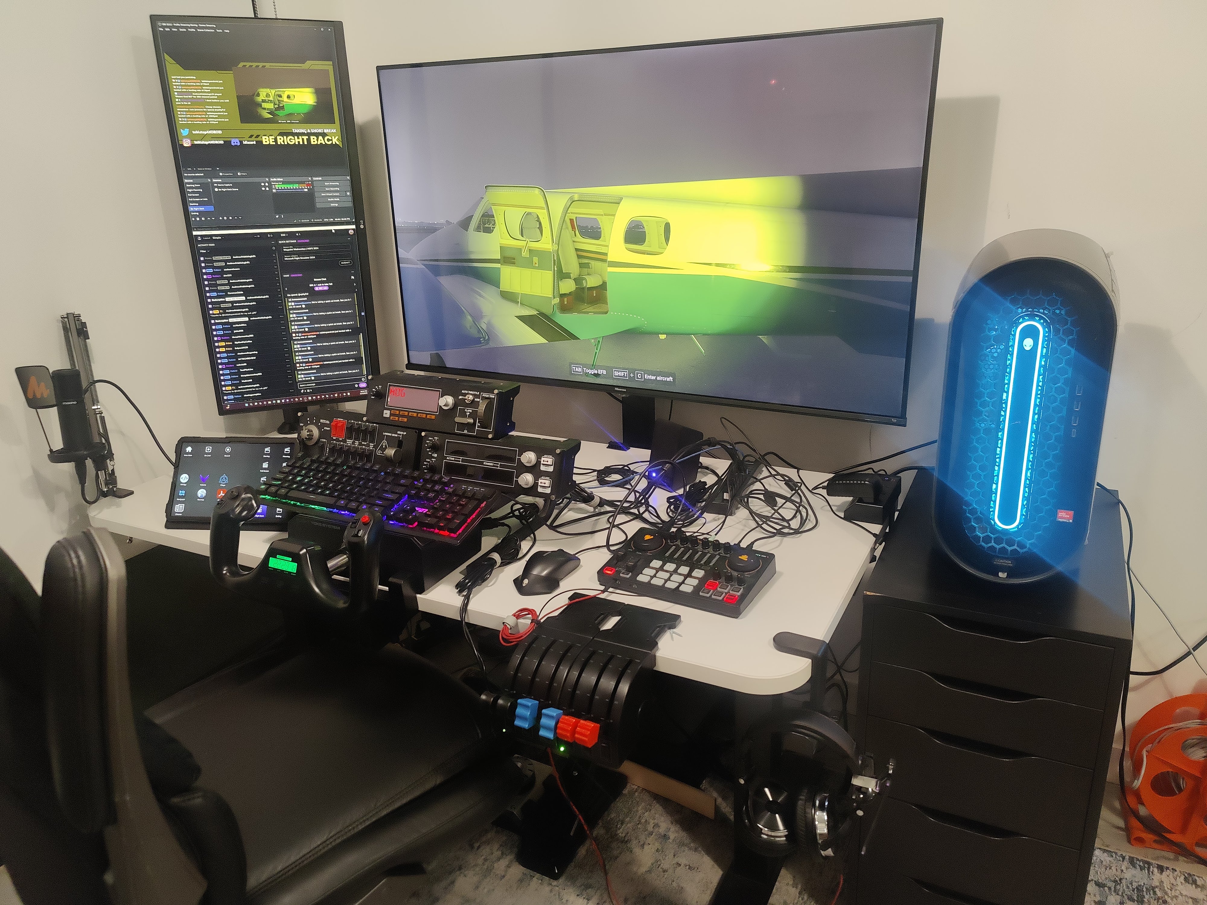 Alienware desktop, two monitors, and flight sim gear