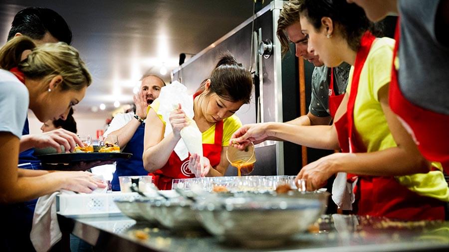 Team cooking together at a Feast Fights competition