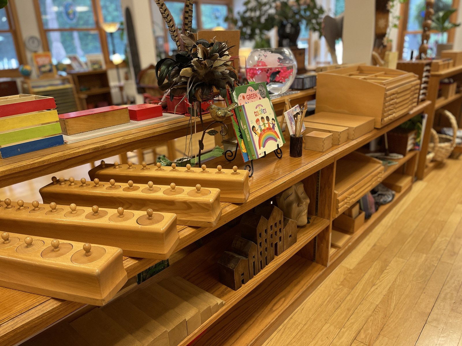 A prepared Montessori shelf of materials at Countryside