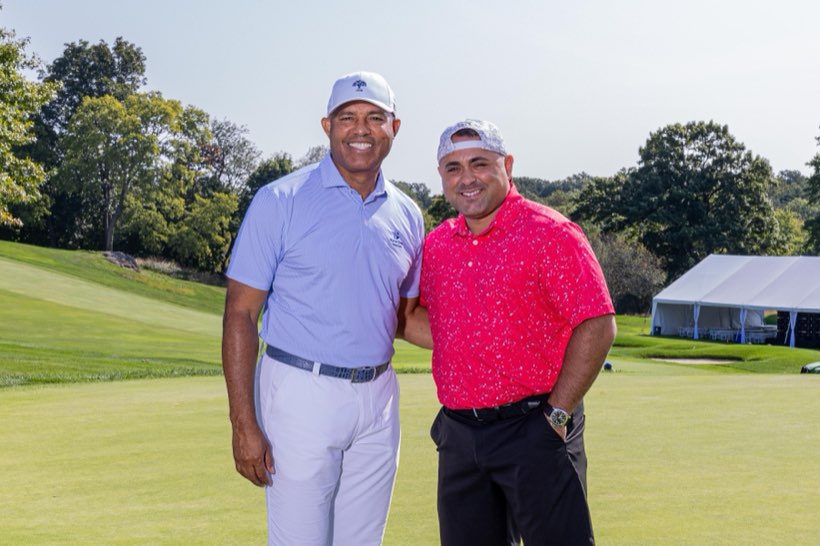 A guest photographed with Mariano Rivera