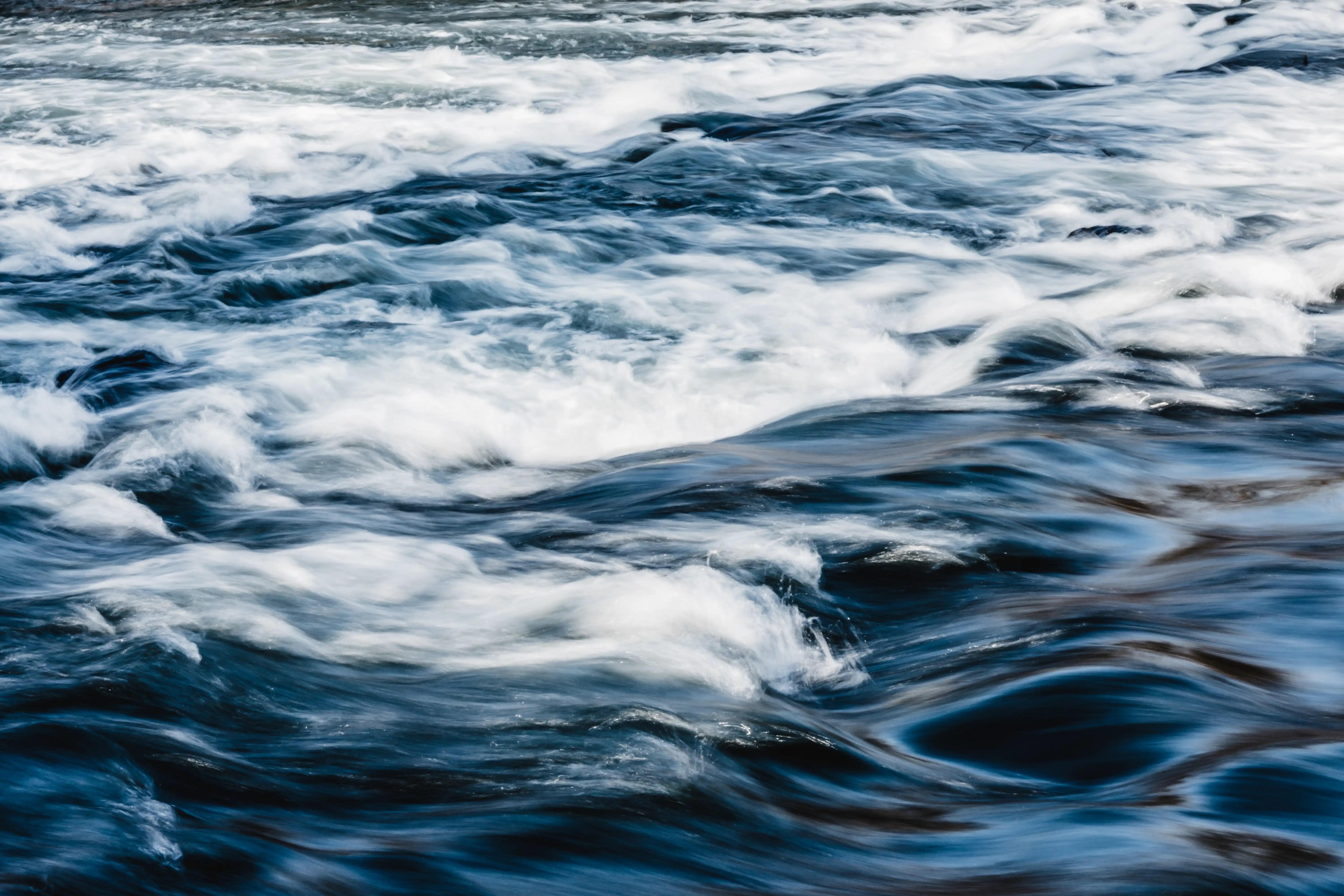 Wavy Water Rolling Into Shore