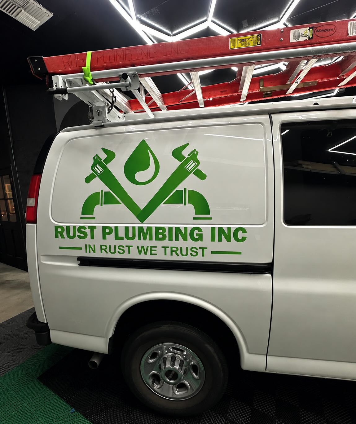 Completed van branding wrap, Ron's Plumbing