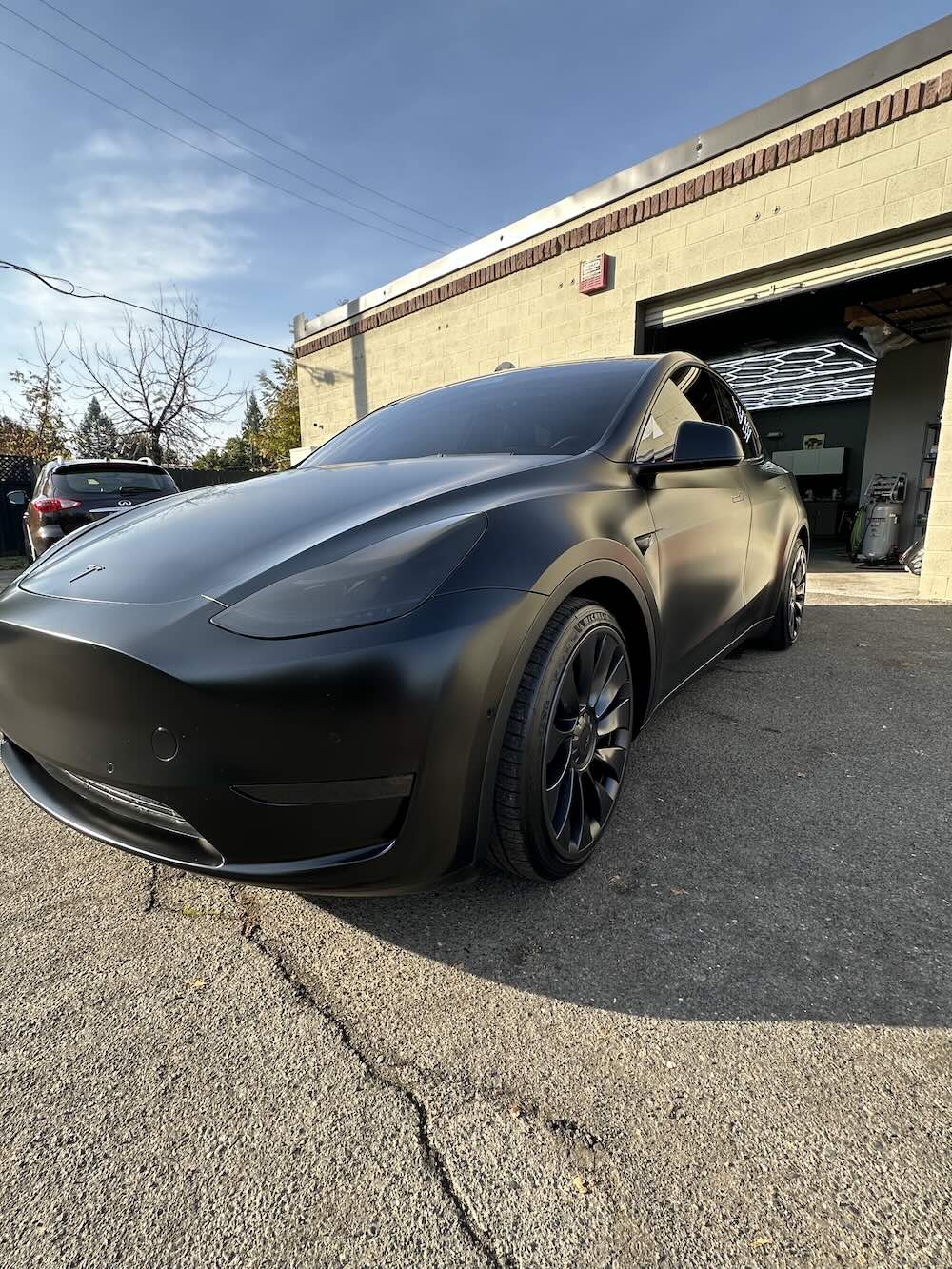Completed vinyl wrap, satin black Tesla