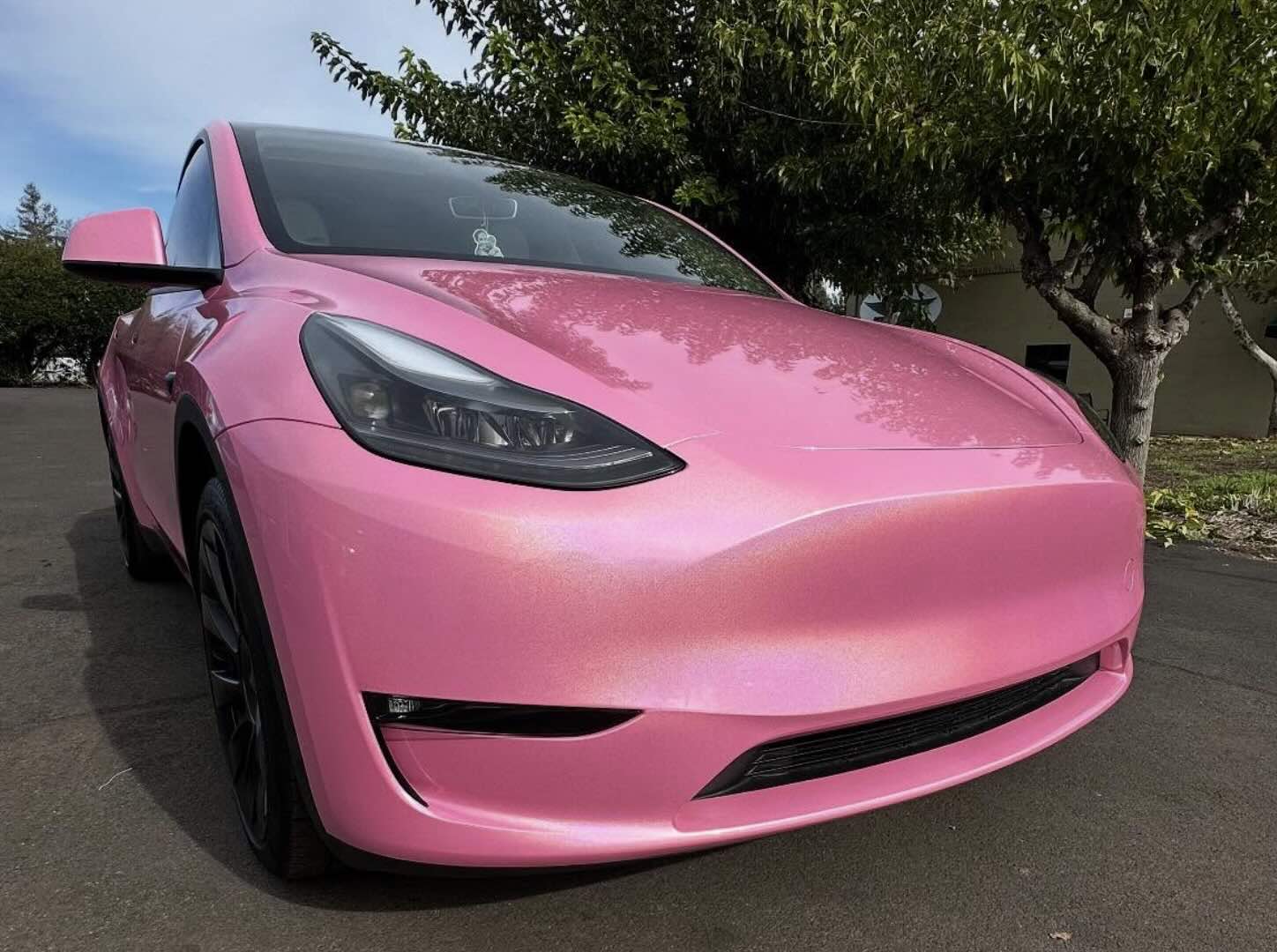 Completed vinyl wrap, pink Tesla