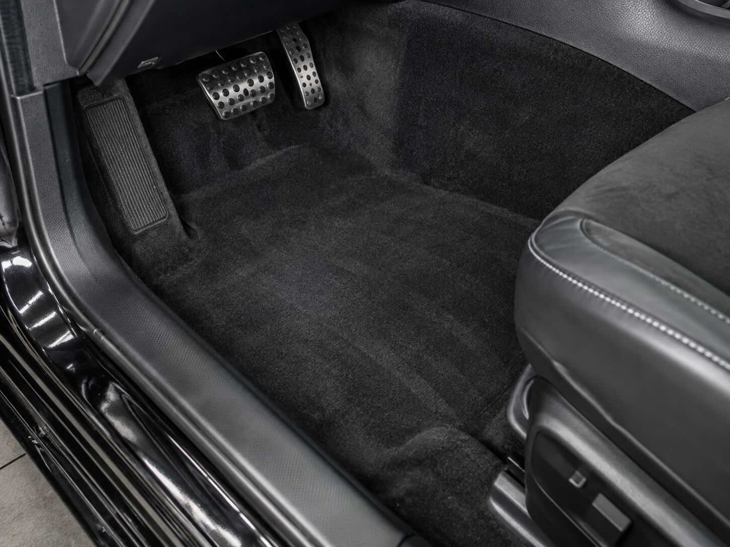 Freshly cleaned vehicle interior carpet