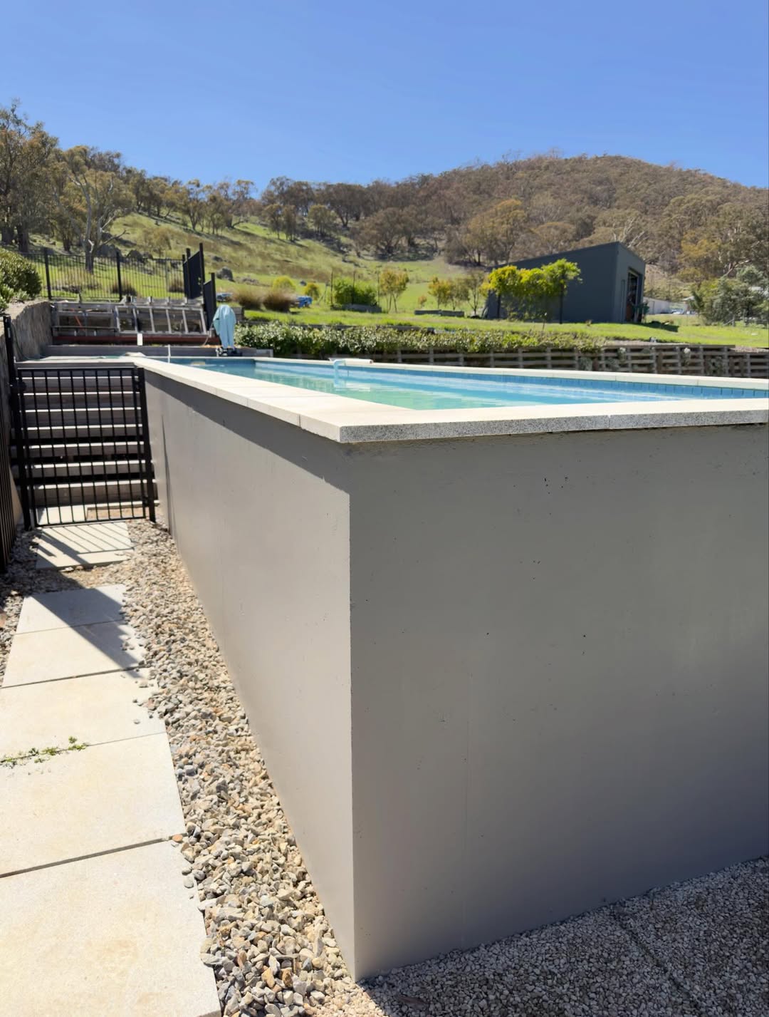 Pool surrounds after painting, rural ACT