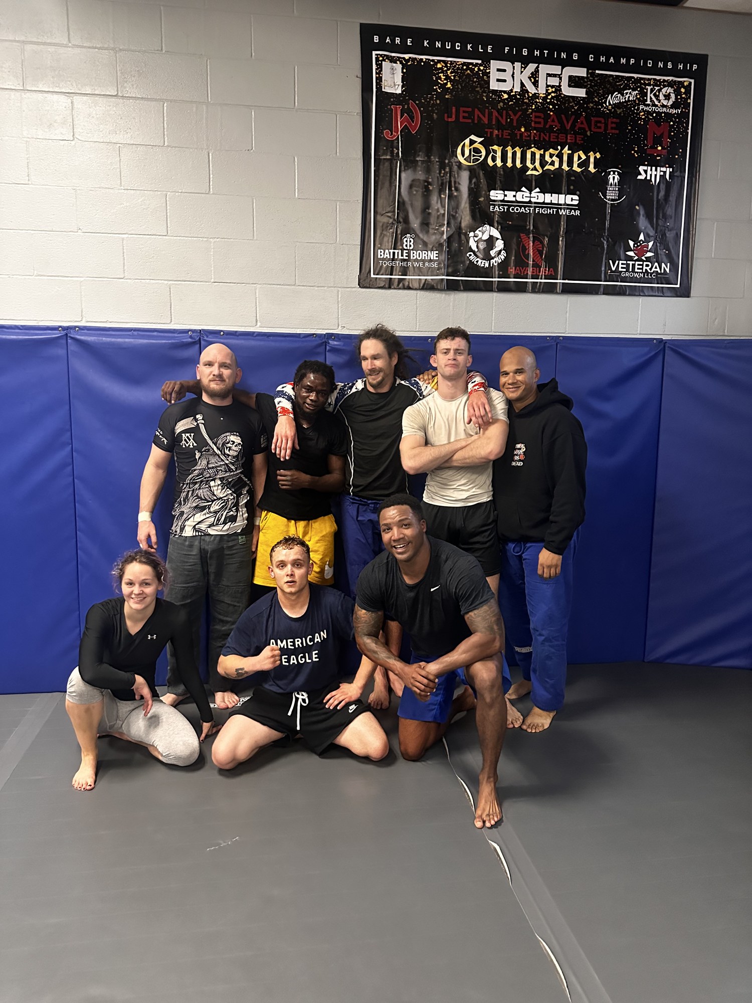 Wildside jiu jitsu class group photo on the mats