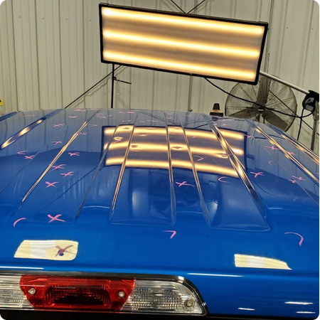 Paintless Dent Repair Technician at Work