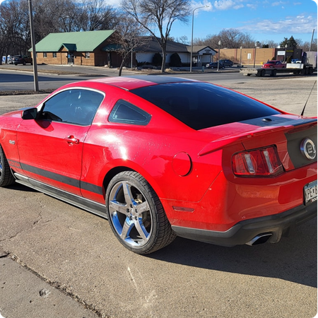 Automotive Window Tint Installation on Vehicle Glass