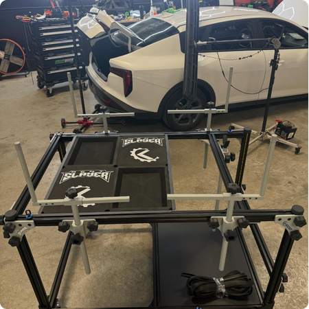 Technician Demonstrating the Paintless Dent Repair Process