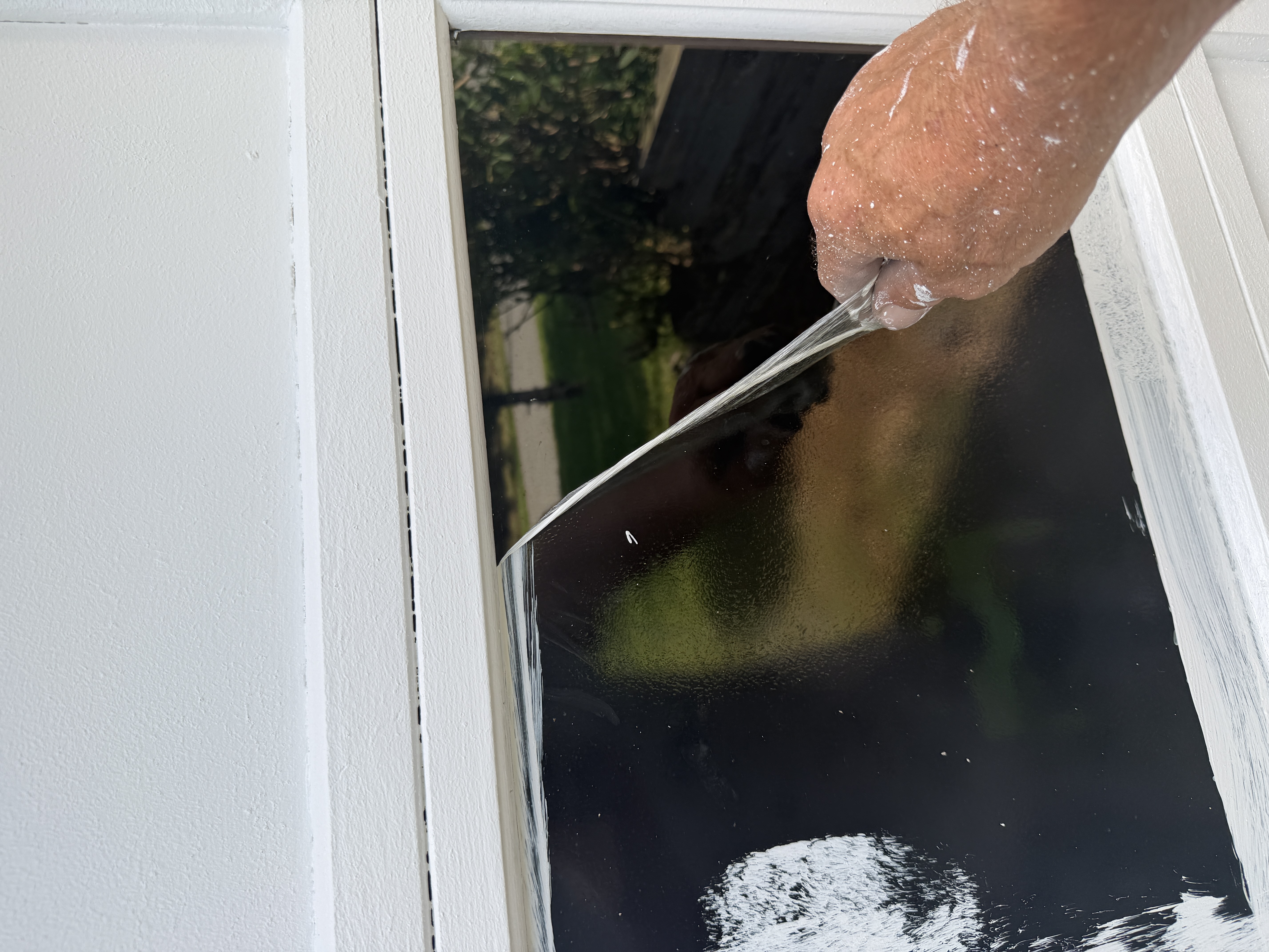 Garage door painting by Covell and Sons Painting