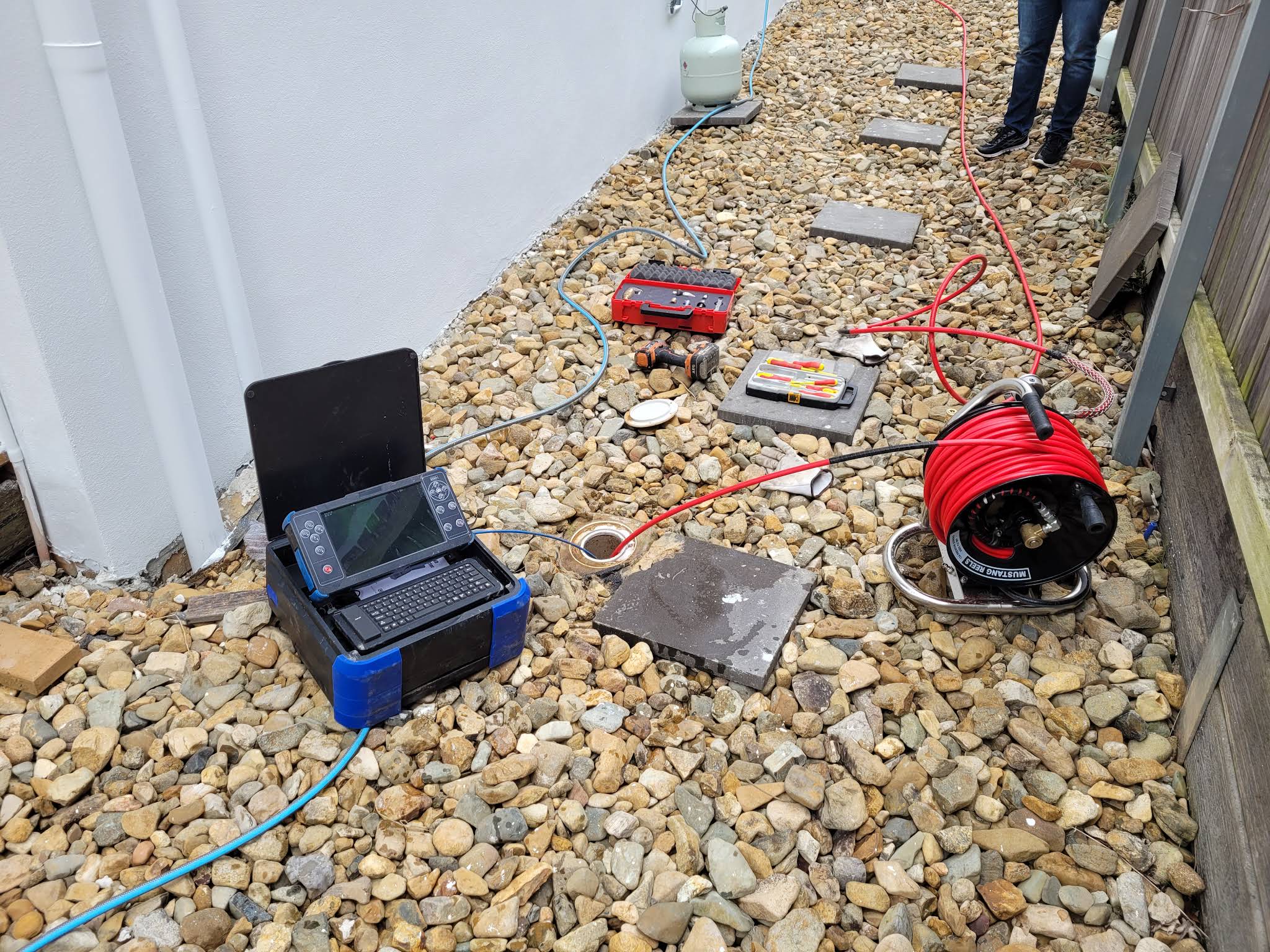 CCTV drain inspection equipment set up at a residential Greenslopes property to diagnose a blocked drain.