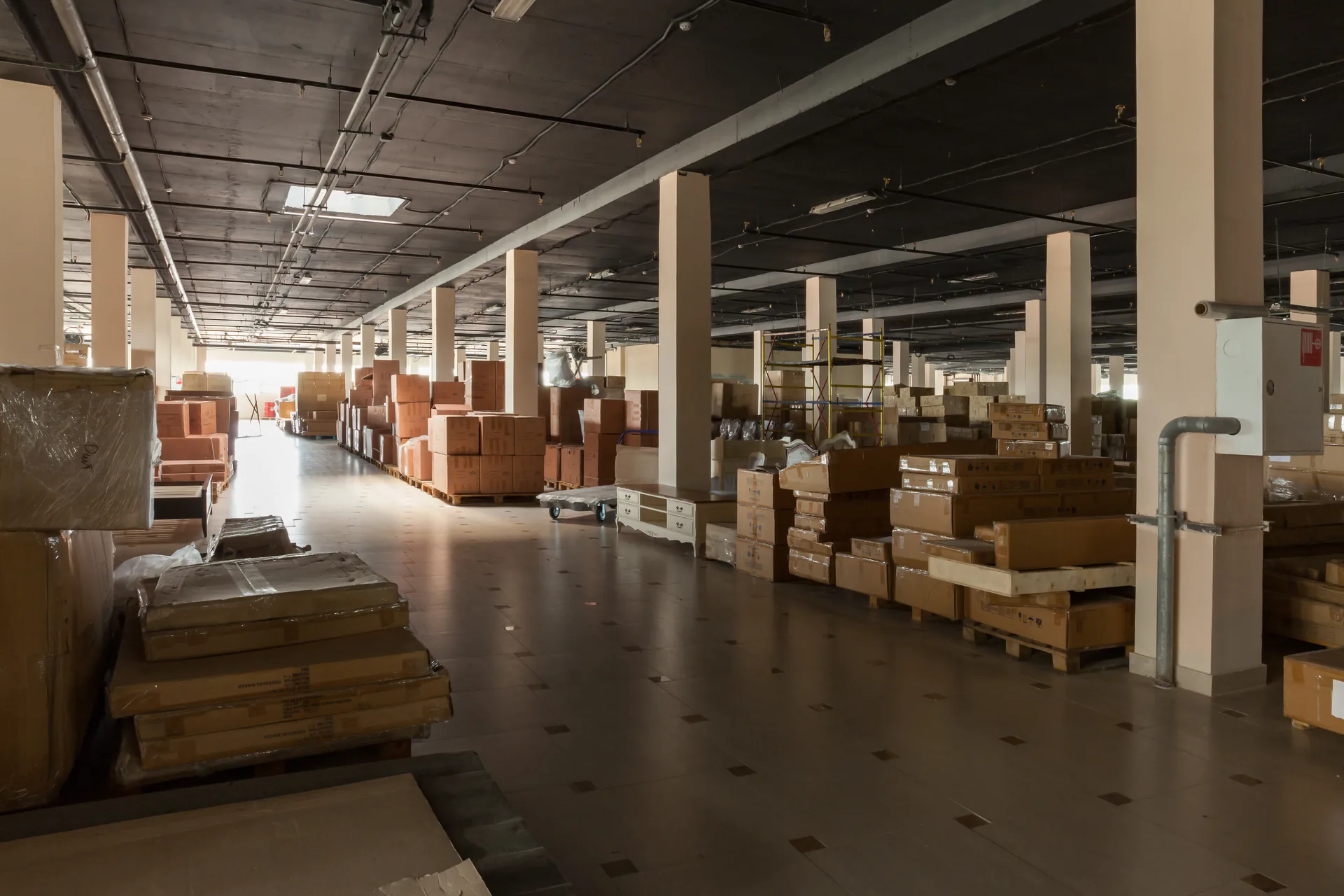 Hercules receiving warehouse with crated designer furniture ready for white glove delivery