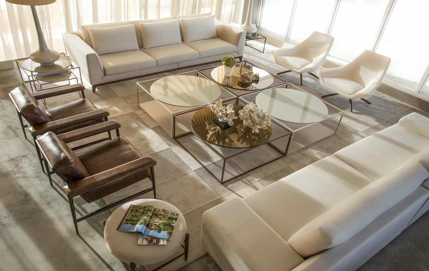 Modern furnished interior with glass-top table