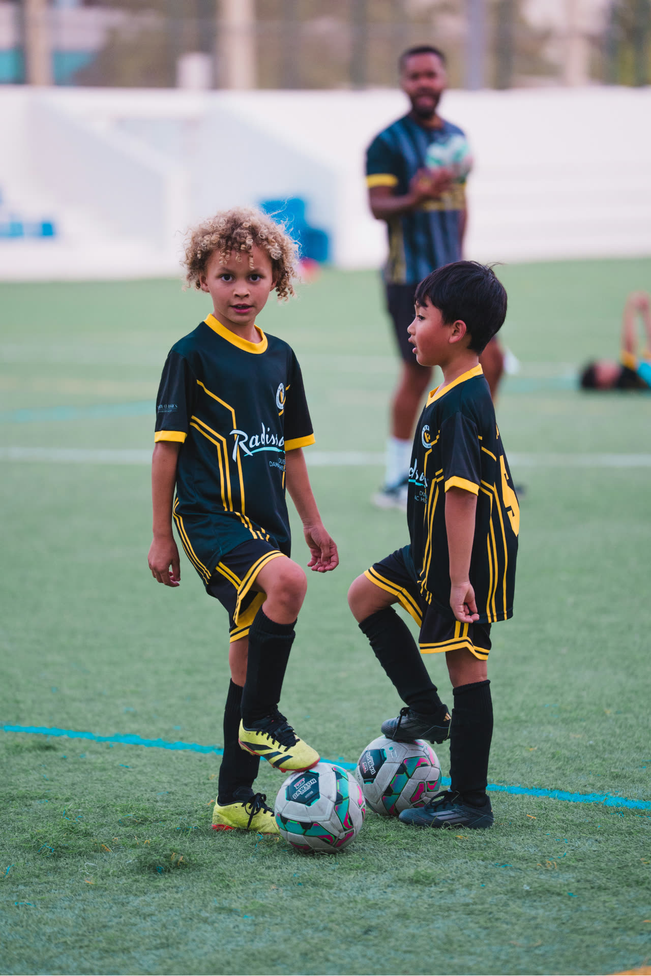 Two VPS Academy players with the ball
