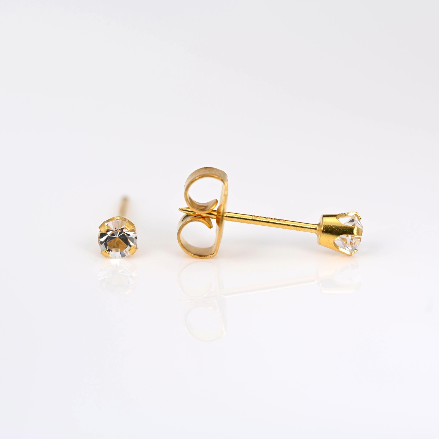 9ct gold Tiffany-set cubic zirconia stud earrings