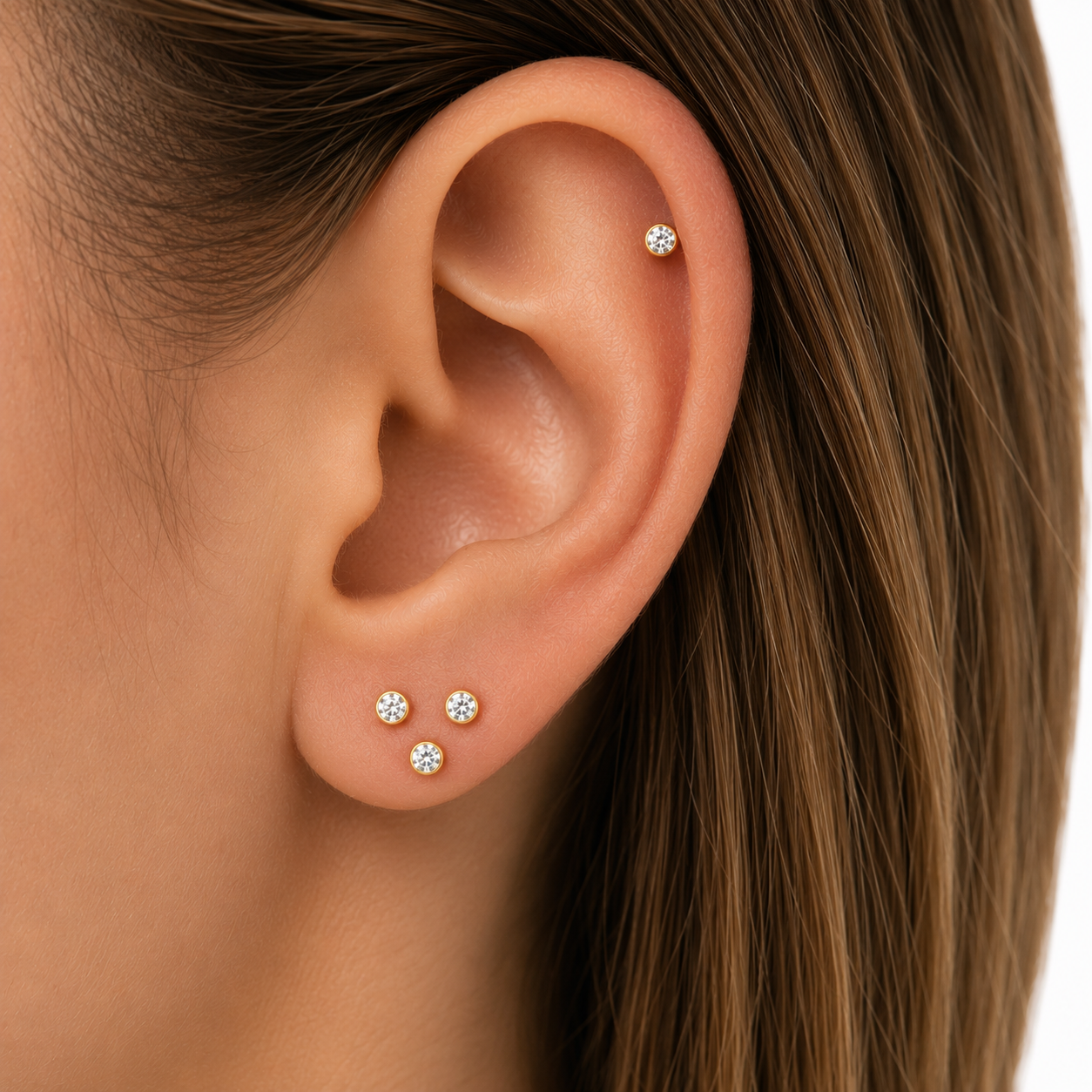 Ear curation example with layered lobe and helix piercings