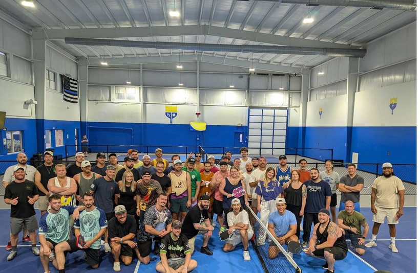 Forty-person group photo at a Pickleball Kingdom event