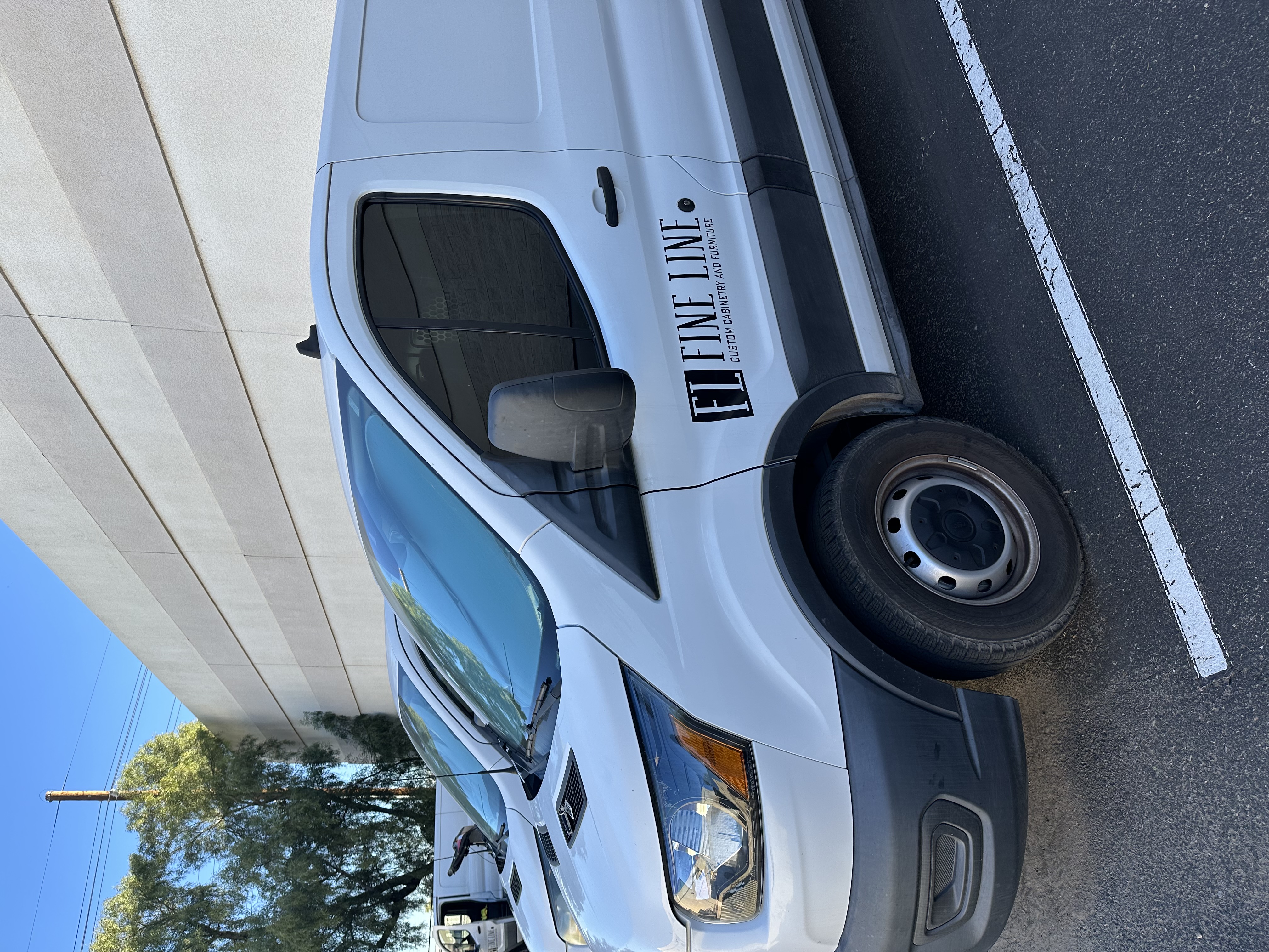 Fleet tint — Fine Line Cabinetry commercial van with dark window tint