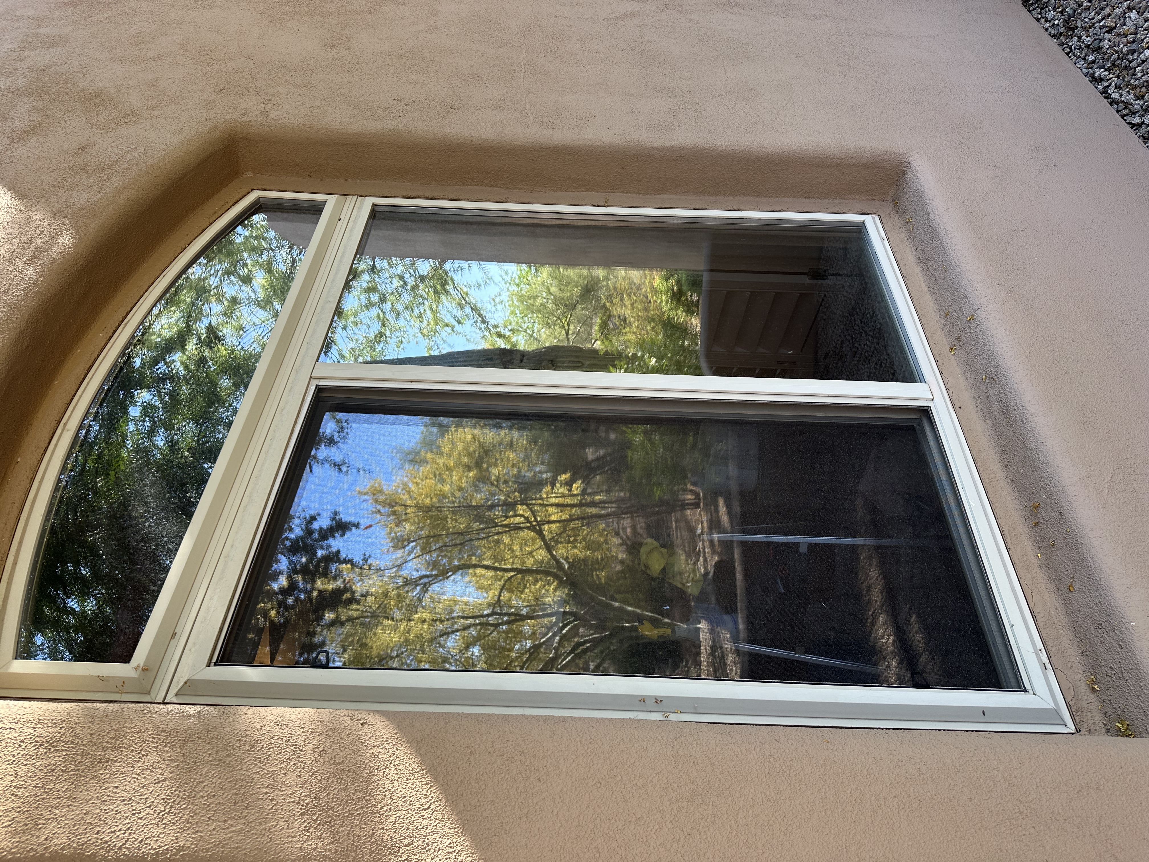 Residential window tinting installation at Arizona home