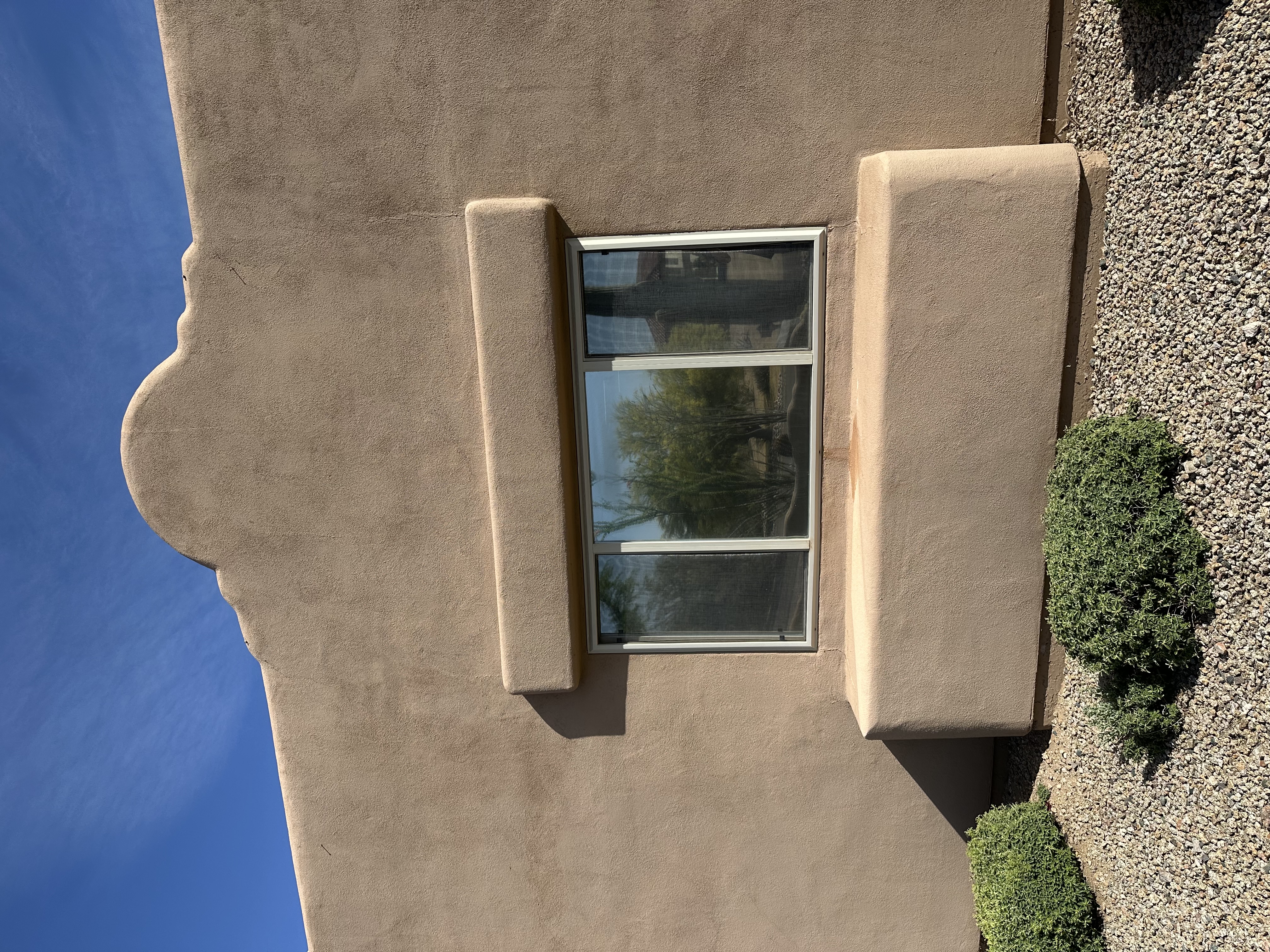 Residential window tint installation — large format windows