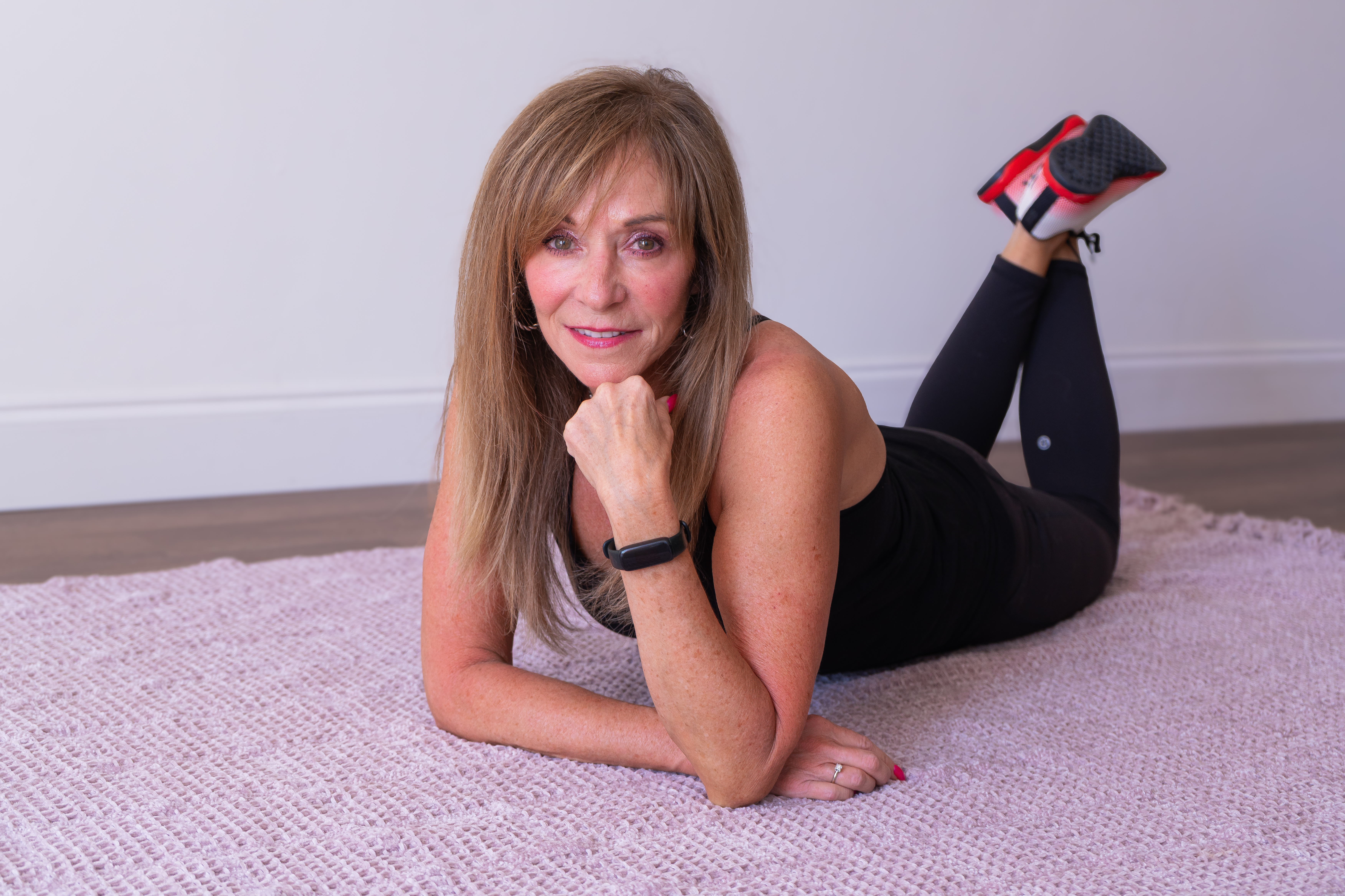 Ronda from Rejuven8 Daily smiling during a wellness and healthy lifestyle photo session for women 35 and older