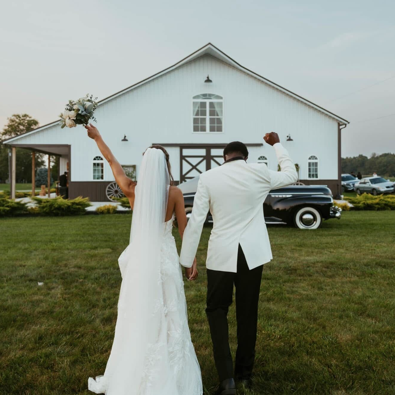 Shady Brook Acres wedding venue in Napoleon, Ohio with rustic elegance, a waterfall, pavilion, and bright neutral barn