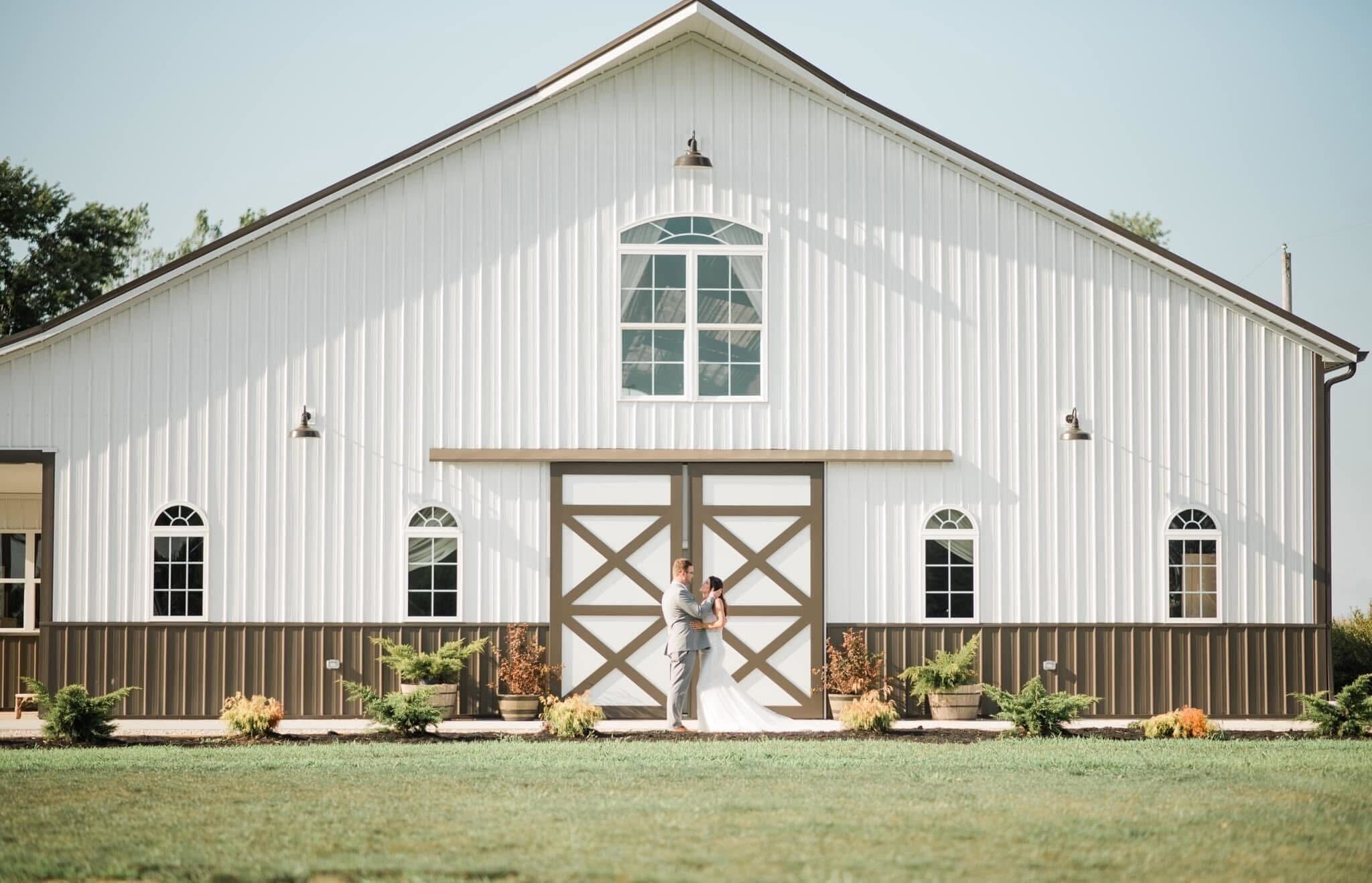 Shady Brook Acres wedding venue in Napoleon, Ohio with rustic elegance, a waterfall, pavilion, and bright neutral barn