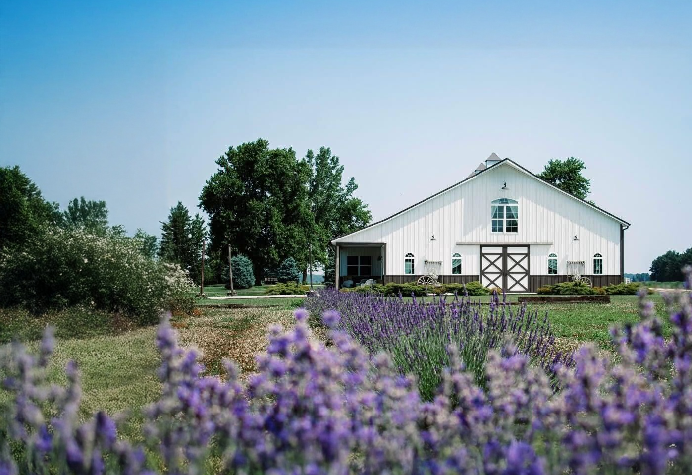 Shady Brook Acres wedding venue in Napoleon, Ohio with rustic elegance, a waterfall, pavilion, and bright neutral barn