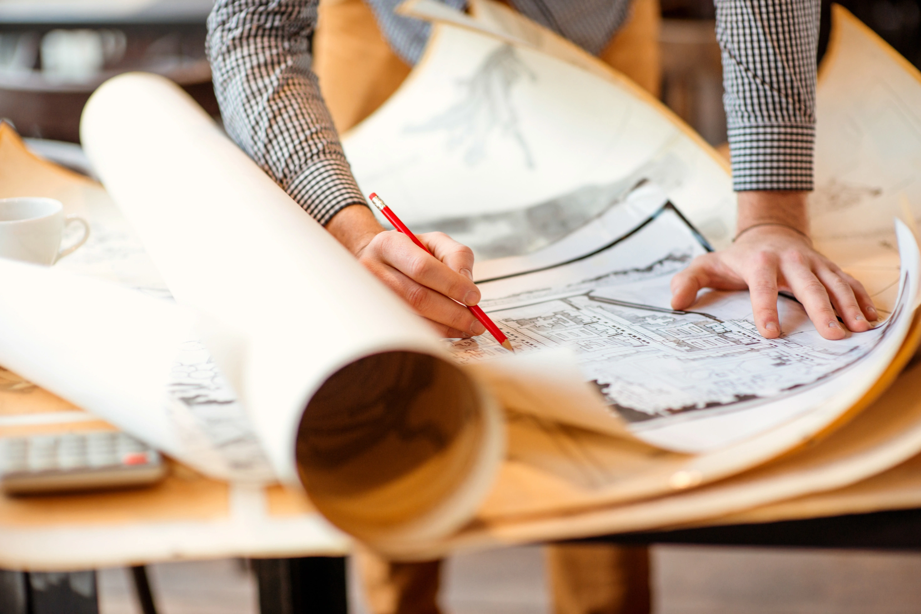 Plans and site documentation laid out before construction begins