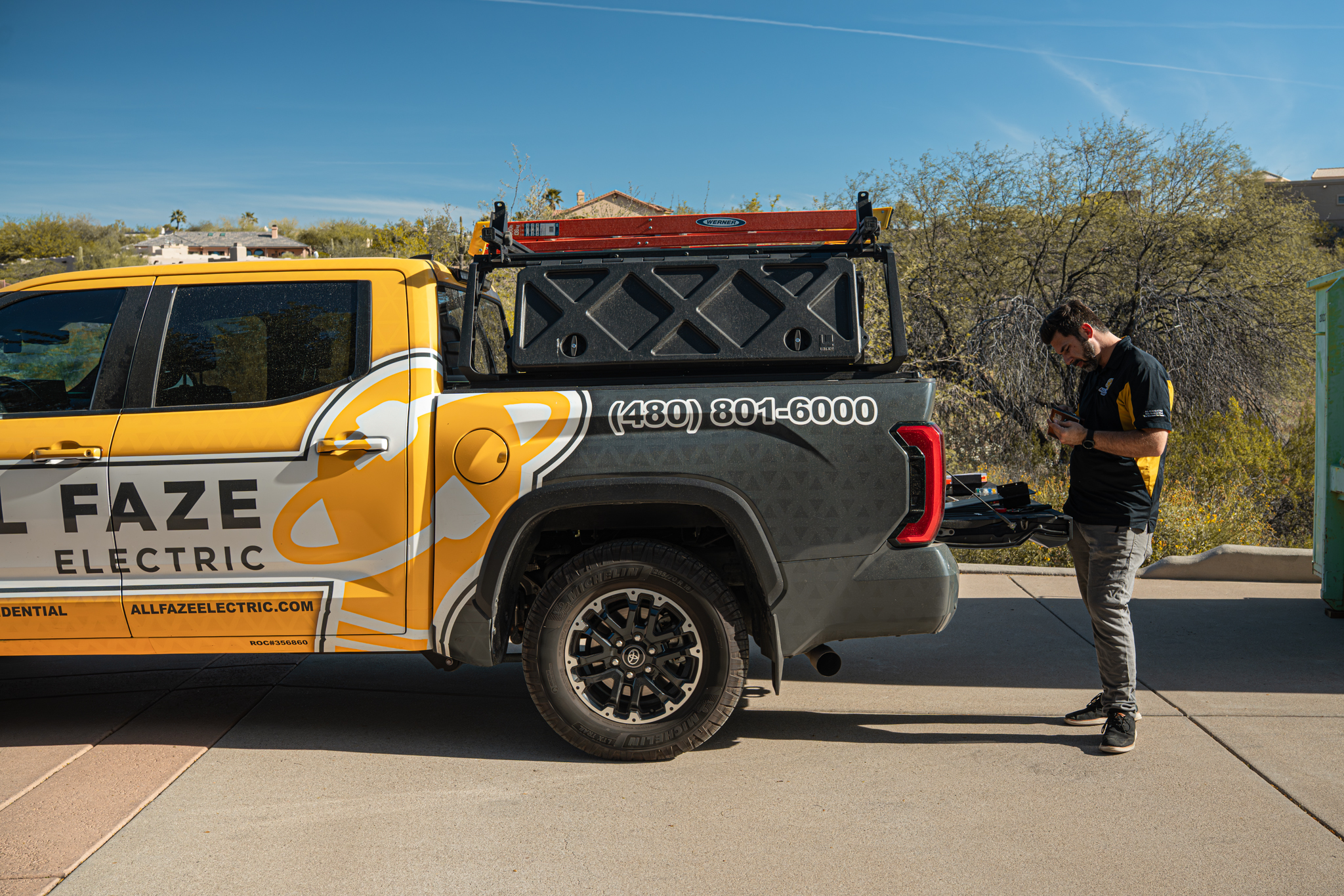 All Faze Electric truck with worker on site