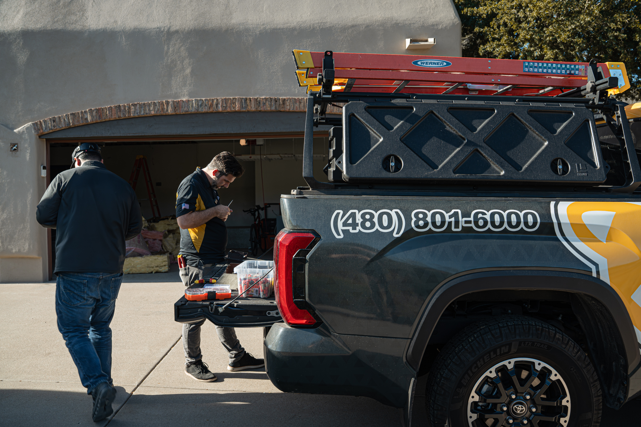 Owner Jonathan Leon beside the All Faze Electric truck