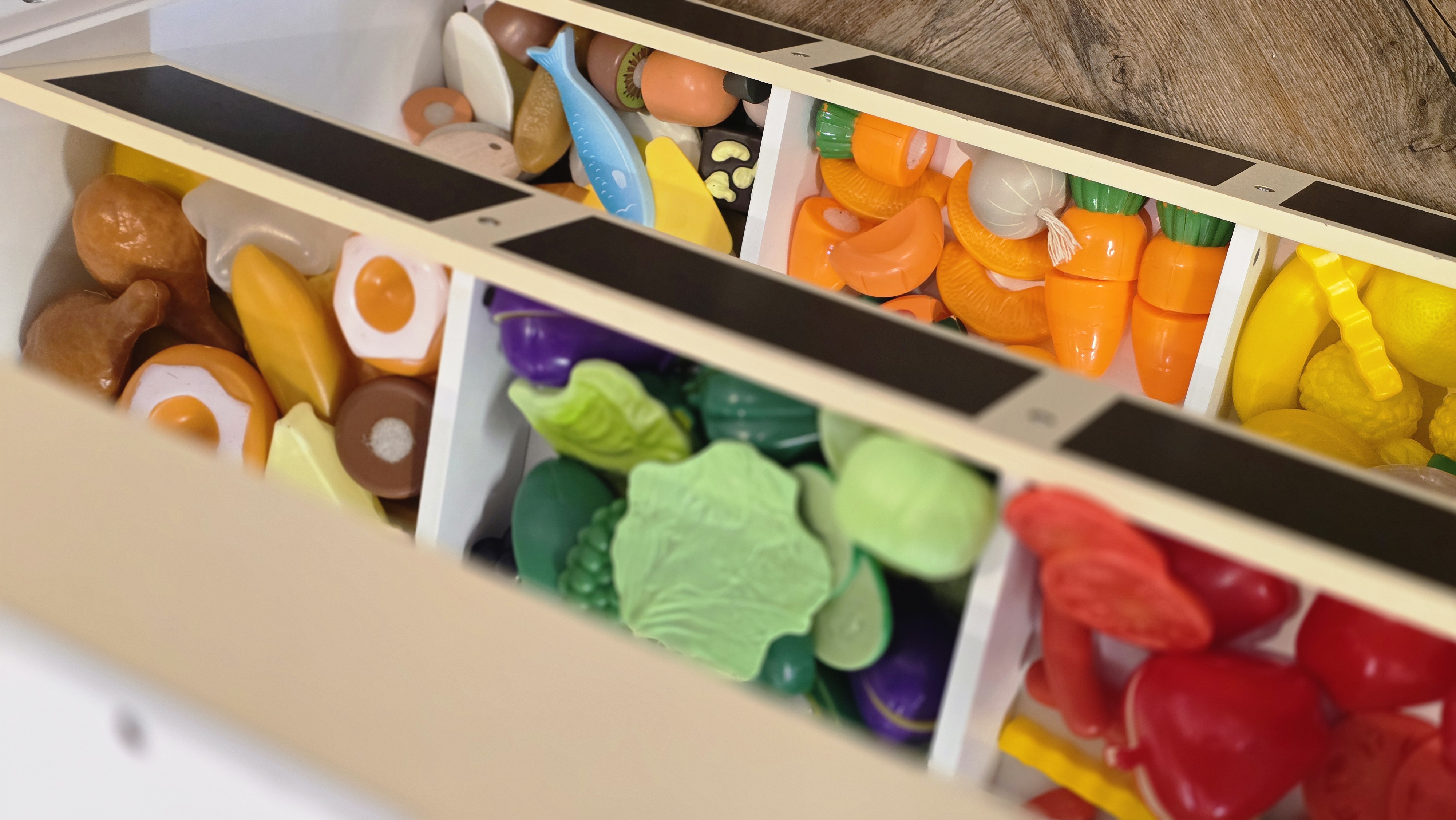 Wooden market playhouse with felt play fruit and sage accents