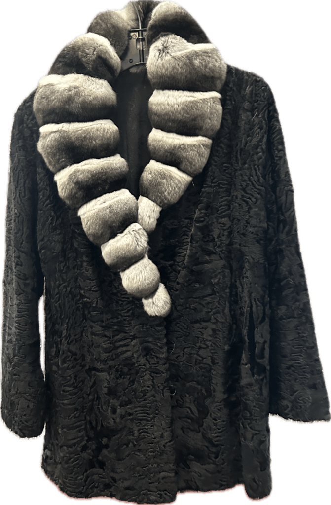 Black coat with a grey and white striped fur collar