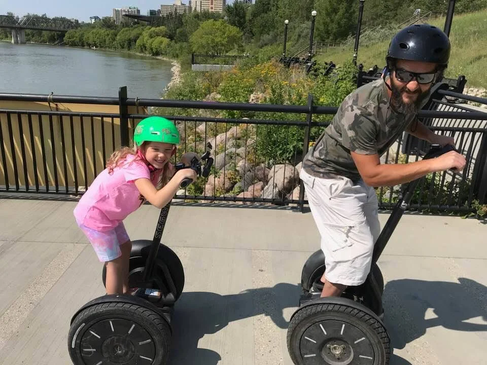 Kids learning to ride a Segway