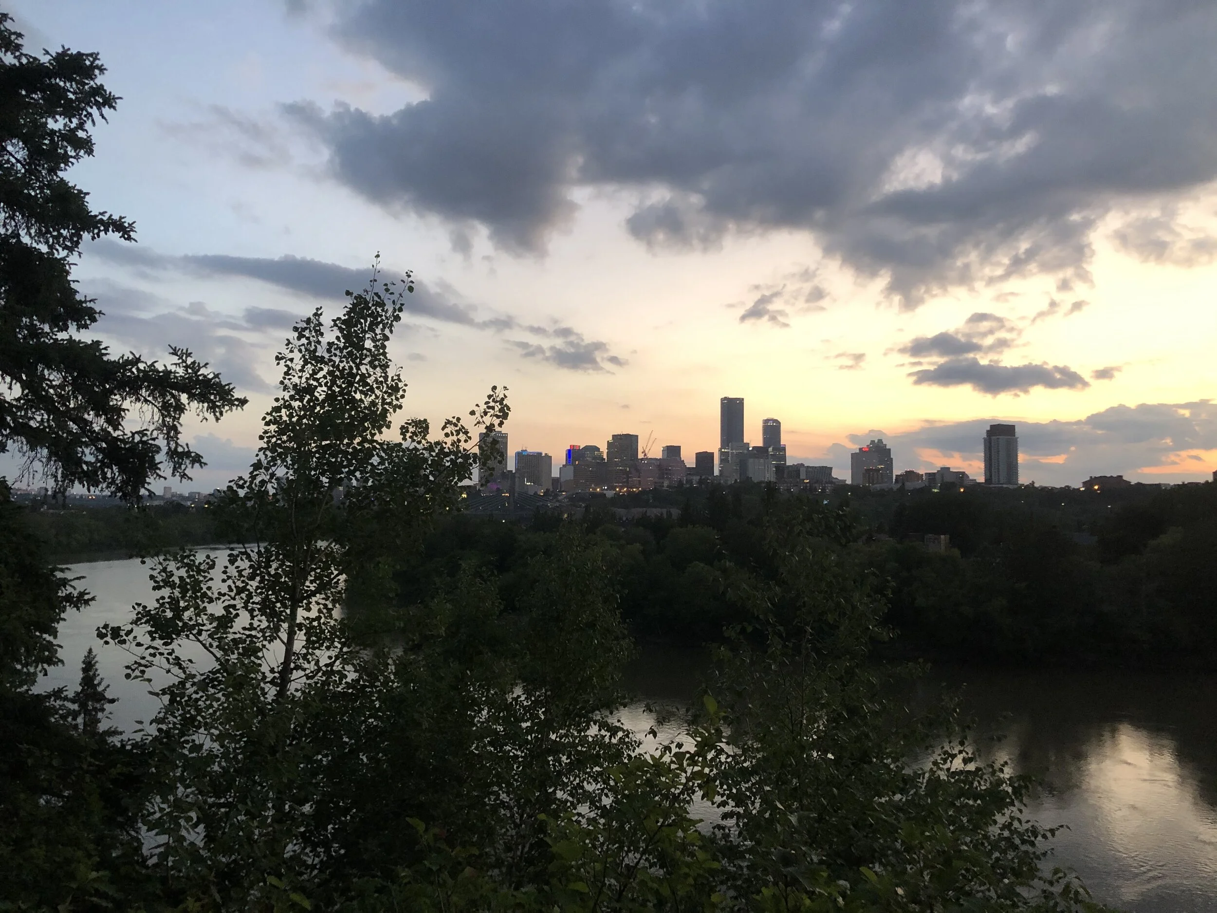 Segway riders enjoying a beautiful sunset over the river valley