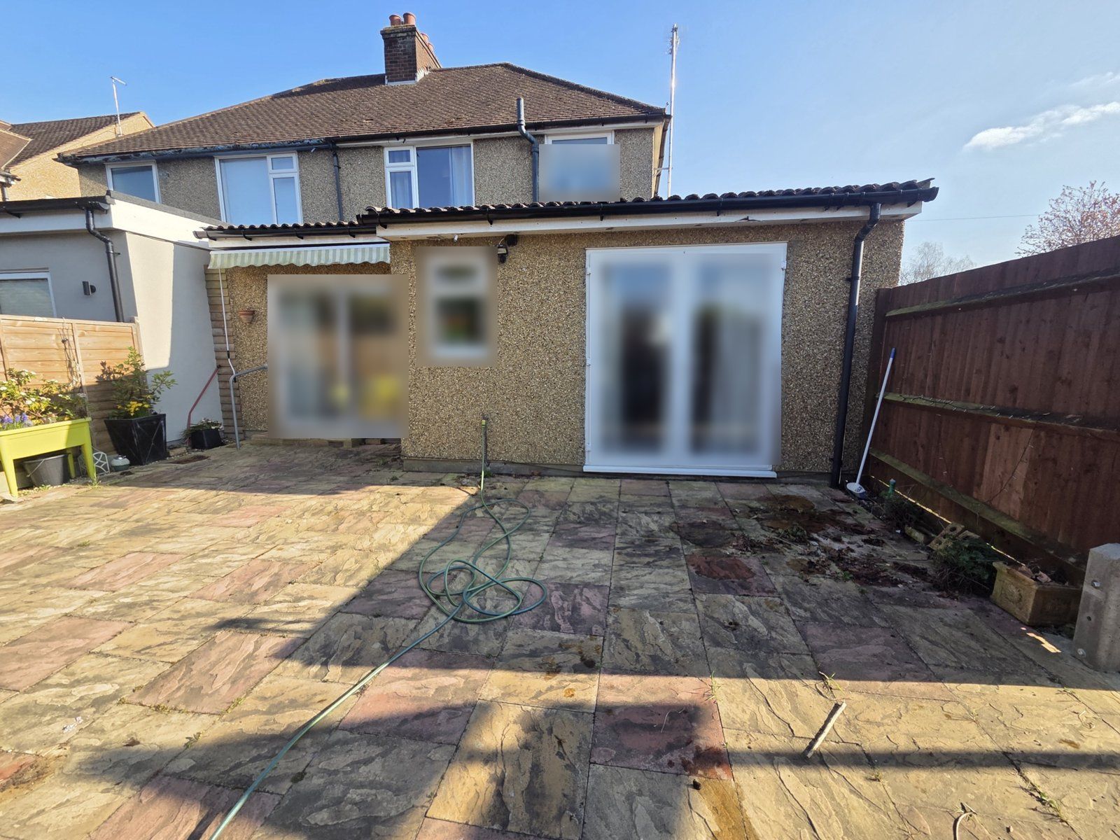 Before: algae-covered patio