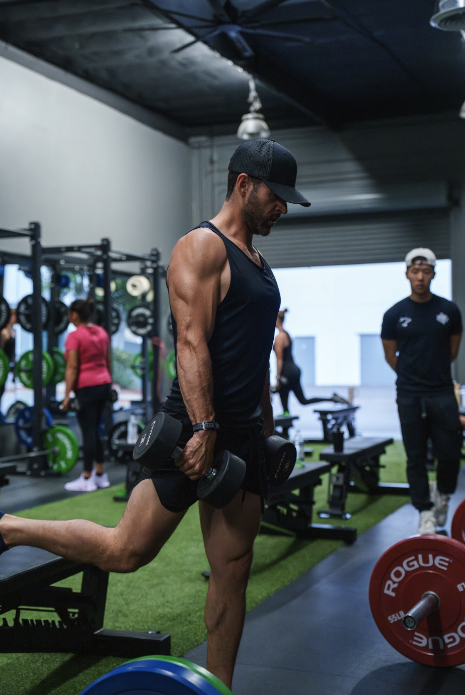 Weighted split squat session during a group fitness class in Garden Grove.
