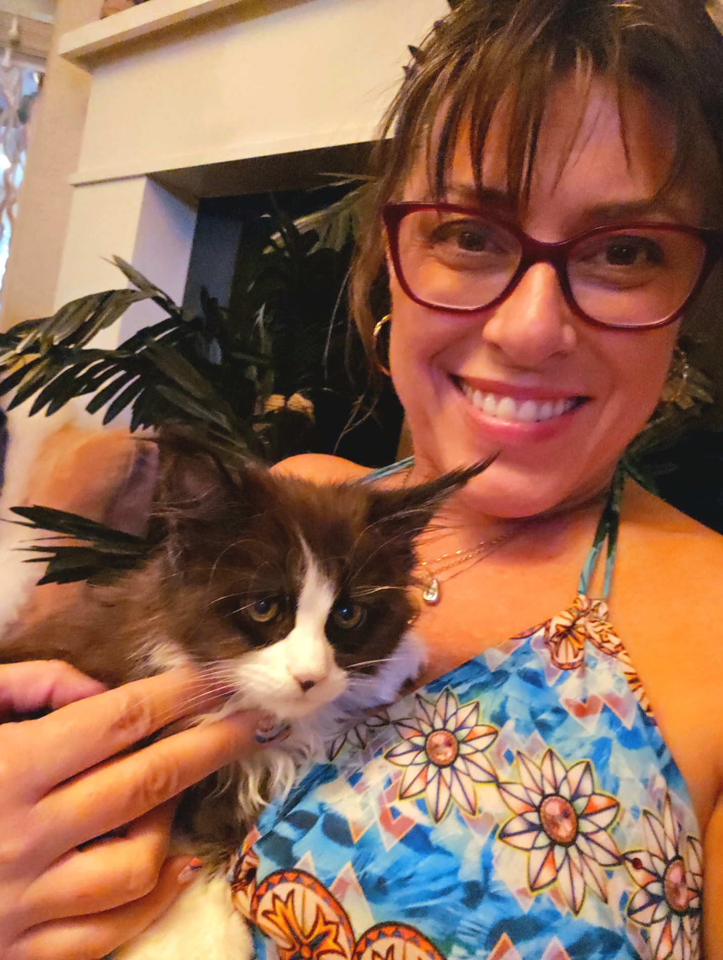 happy me holding kitten after a sound bath and meditation