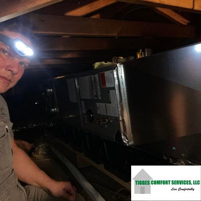 Jason Inspecting Ductwork for Tigges Comfort Services - Redfield, IA