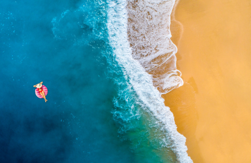 woman floating in ocean