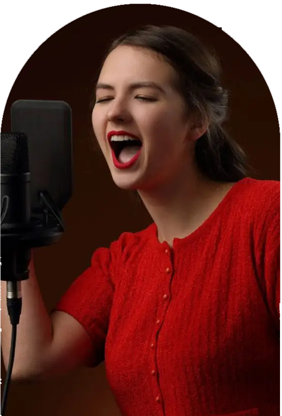 happy woman singing with a microphone