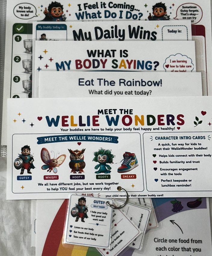 Close-up of WellieWonders character cards and a selection of family learning tools; full activity sheets not shown